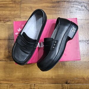 Alegria Black Slip-On Leather Loafers with Butterfly Heel Accent